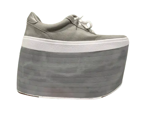 Finished custom shoe lift built into the sole of a customer's shoe by Exclusive Shoe Lifts