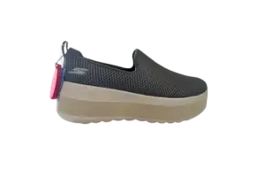 Custom orthopedic shoe lift built into a sneaker sole